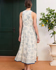 Fitted linen midi dress: ALÉMAIS Lucky Lace Up Midi Dress side view showing the structured, sleeveless holiday silhouette.. LUXAMORE