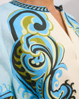 Premium resort-wear fashion: Close-up of the breathable European flax linen and cropped sleeves on the Natalia dress.. LUXAMORE