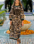 Alemais Maroc Midi Dress worn by model in natural setting LUXAMORE
