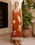 Alemais Soleil D'amour Silk Midi Dress worn by model in natural setting LUXAMORE