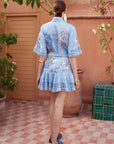 Alemais Villa Romantica Mini Dress worn by model in natural setting LUXAMORE