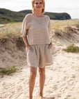Eadie Lifestyle Olivia Linen Top worn by model in natural setting LUXAMORE