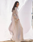 Estilo Emporio El Manto Stripe Dress + Duster worn by model in natural setting LUXAMORE