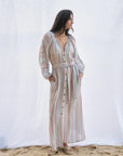 Estilo Emporio El Manto Stripe Dress + Duster worn by model in natural setting LUXAMORE