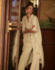 Estilo Emporio La Cota Cover Up Linen Dress worn by model in natural setting LUXAMORE