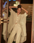 Estilo Emporio La Cota Cover Up Linen Dress worn by model in natural setting LUXAMORE
