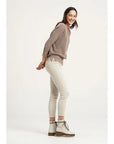 Estilo Emporio Linen Pant Stretch- Natural worn by model in natural setting LUXAMORE