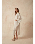 Estilo Emporio Nebbilio Linen Dress - Lyla worn by model in natural setting LUXAMORE