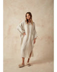 Estilo Emporio Nebbilio Linen Dress - Lyla worn by model in natural setting LUXAMORE