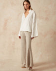 Woman Wearing Estilo Emporio Novo Flare Pant - Brasile Natural - Pants LUXAMORE