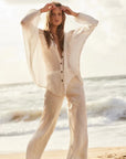 Woman Wearing Estilo Emporio Novo Flare Pant - Brasile Panna White - Pants LUXAMORE