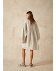 Estilo Emporio Stella Linen Dress - Lyla worn by model in natural setting LUXAMORE