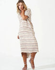 Estilo Emporio Zaza Linen Dress - Marrakesh worn by model in natural setting LUXAMORE