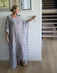 Exclusive: Estilo Emporio Polla Maxi Kaftan - Bolegna worn by model in natural setting LUXAMORE