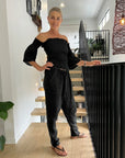 La Bottega di Brunella Pantalone Agathos Linen Pants Black worn by model in natural setting LUXAMORE
