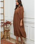 Linen Dress Balloon Sleeve - Made in Italy - Tobacco worn by model in natural setting LUXAMORE