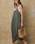 Linen Jumpsuit Made in Italy Tobacco worn by model in natural setting LUXAMORE