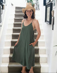 Linen Slip Dress Midi Made in Italy Khaki worn by model in natural setting LUXAMORE