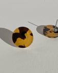 Mingled Tortoise Shell Round Stud Earrings - 15mm worn by model in natural setting LUXAMORE