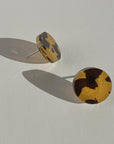 Mingled Tortoise Shell Round Stud Earrings - 15mm worn by model in natural setting LUXAMORE