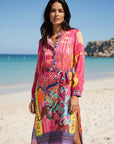 Luxury resort-wear dress: Close-up of the small stand-up collar and button placket on the Miss Goodlife Sunset Dream dress.
