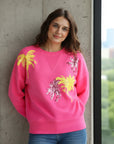 Miss Goodlife Roundneck Palmtree Paillette Sweater Made in Italy worn by model in natural setting LUXAMORE