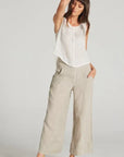 Estilo Emporio Linen Pant Tropez worn by model in natural setting LUXAMORE