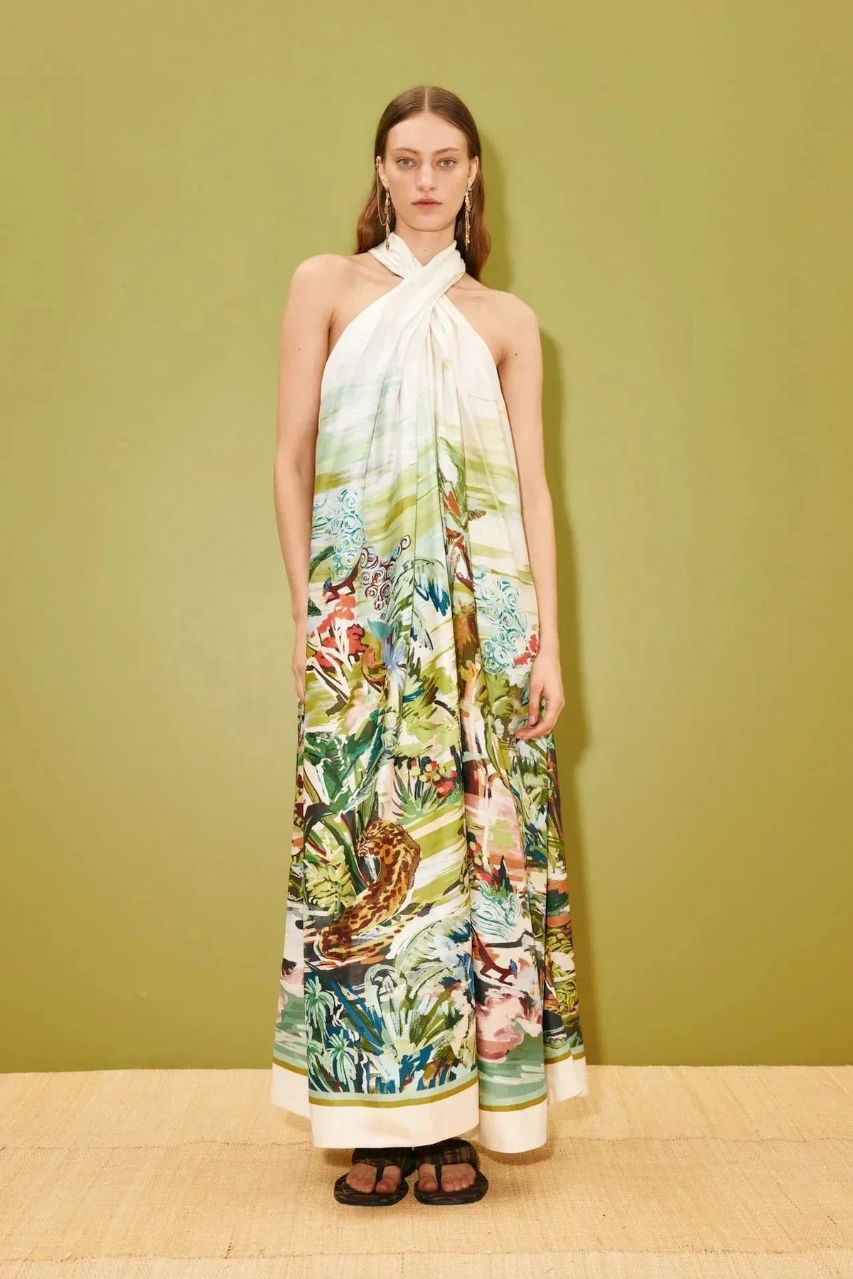 Silk halter maxi dress: ALÉMAIS Jungle Boogie Silk Halter Dress featuring a relaxed trapeze silhouette and vibrant print.. LUXAMORE
