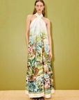Silk halter maxi dress: ALÉMAIS Jungle Boogie Silk Halter Dress featuring a relaxed trapeze silhouette and vibrant print.. LUXAMORE