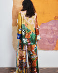 Wide-leg silk pants: ALÉMAIS MLAK Silk Pant featuring a relaxed fluid silhouette and vibrant multicolor graphic print.. LUXAMORE