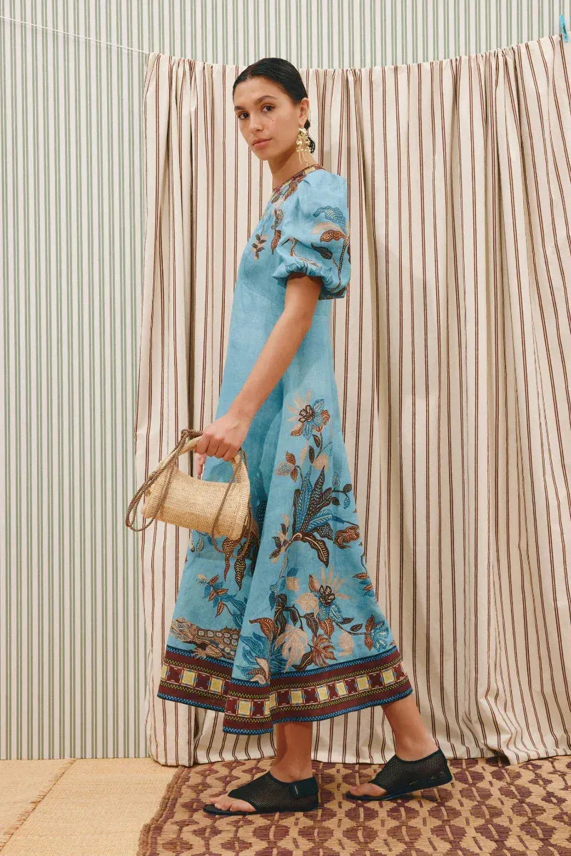 woman wearing Alemais Georgie Midi Dress LUXAMORE 