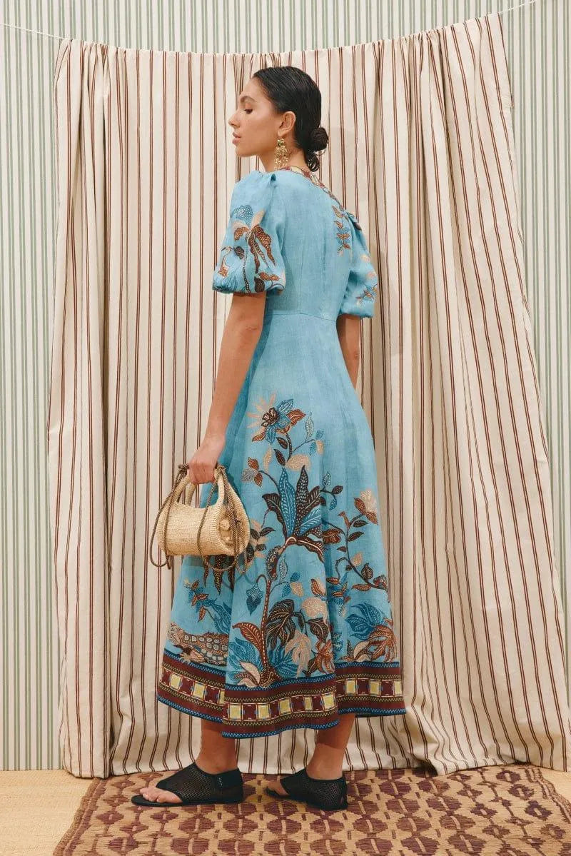 woman wearing Alemais Georgie Midi Dress LUXAMORE 