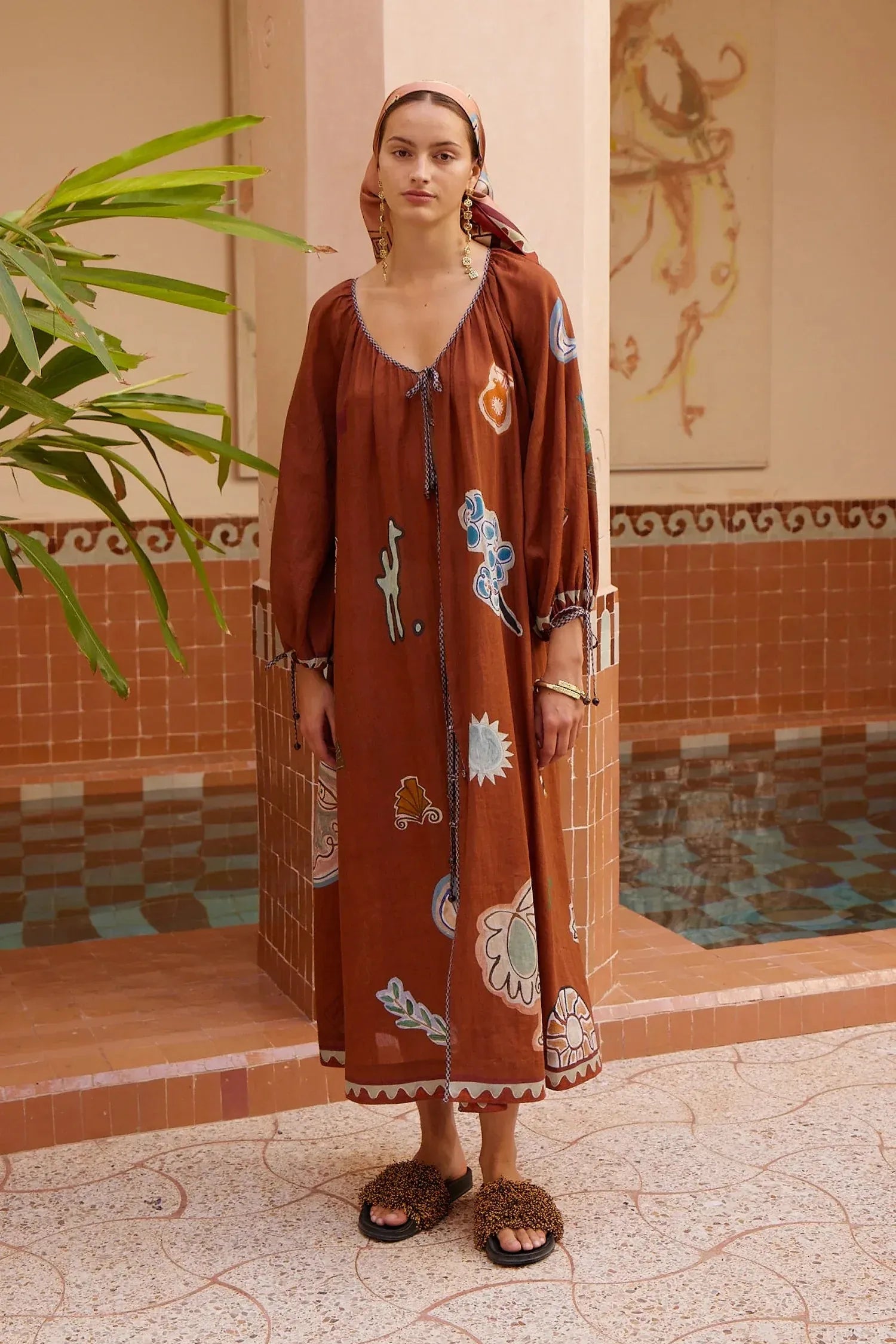 Alemais Laurence Tie Front Shirtdress worn by model in natural setting LUXAMORE 