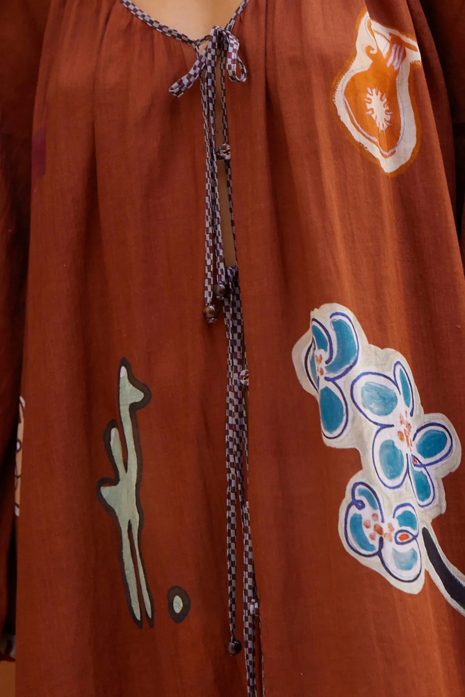 Alemais Laurence Tie Front Shirtdress worn by model in natural setting LUXAMORE 