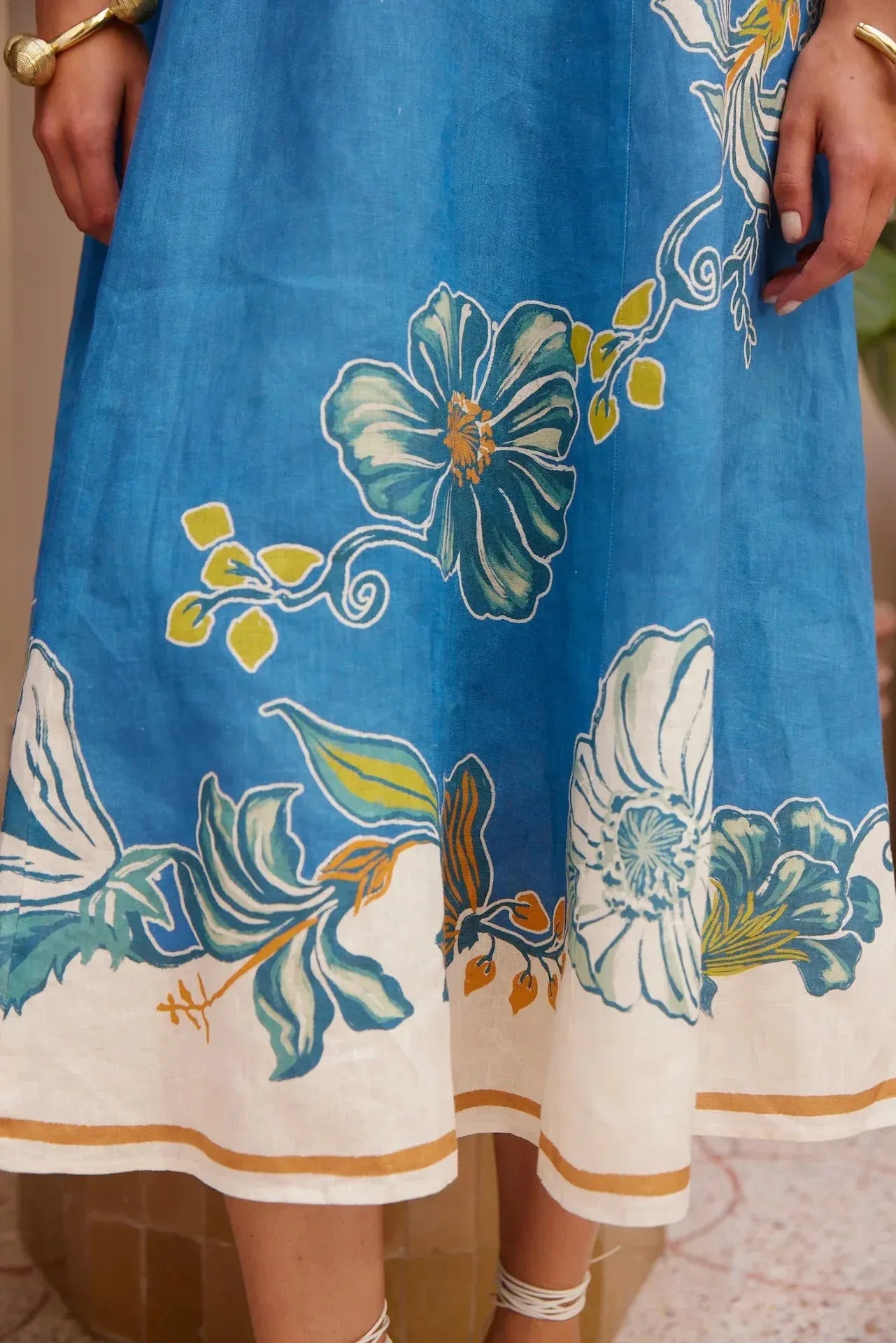 Alemais Luda Midi Dress worn by model in natural setting LUXAMORE 