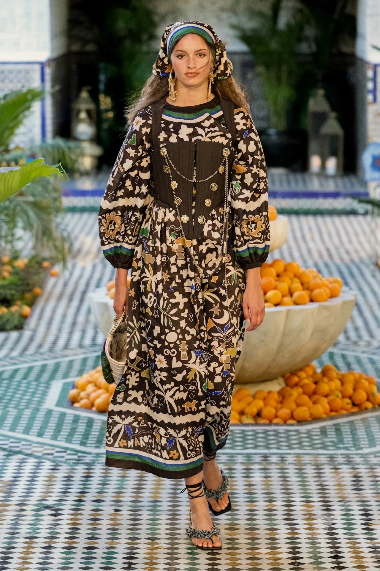 Alemais Maroc Midi Dress worn by model in natural setting LUXAMORE 