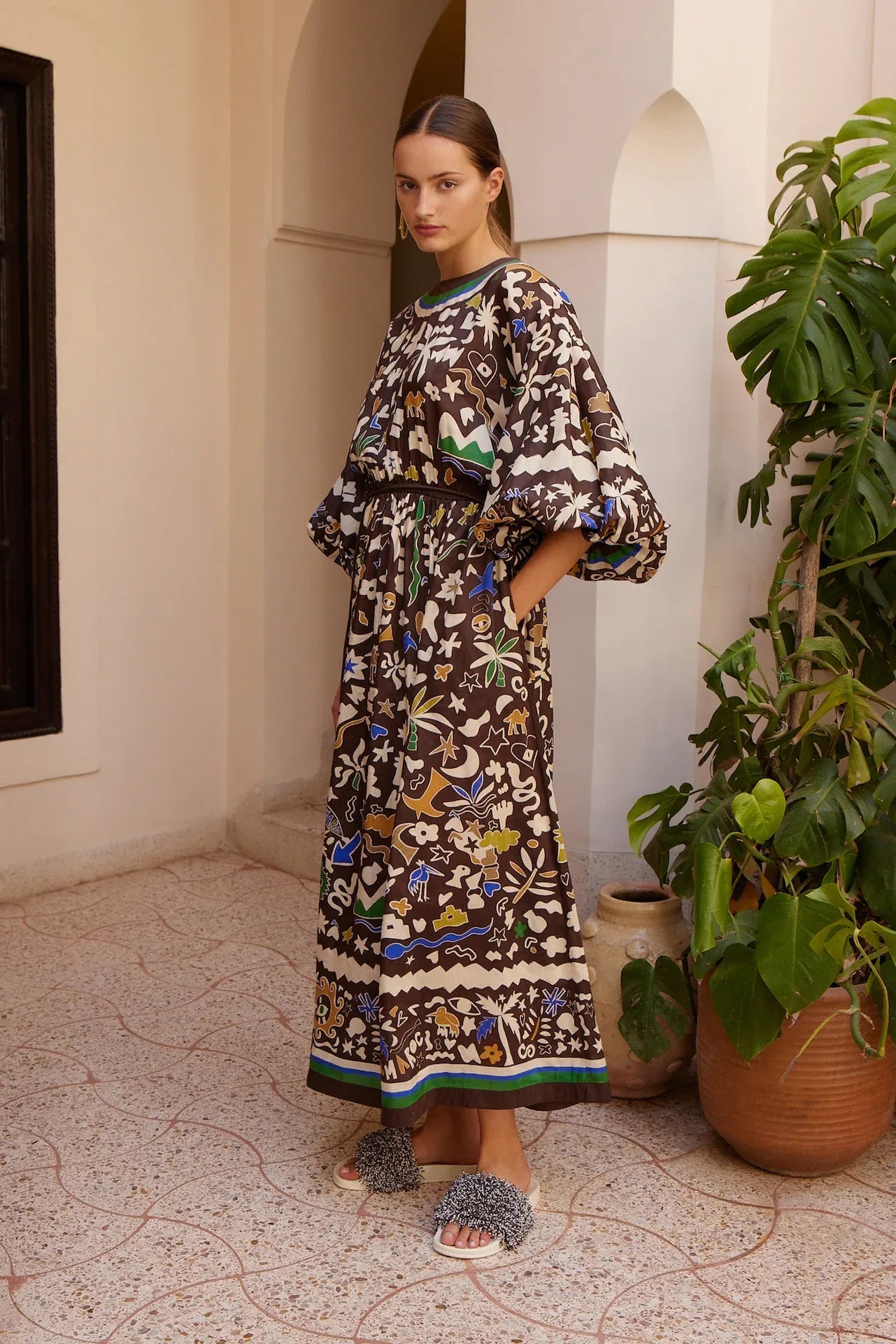 Alemais Maroc Midi Dress worn by model in natural setting LUXAMORE 