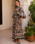 Alemais Maroc Midi Dress worn by model in natural setting LUXAMORE 