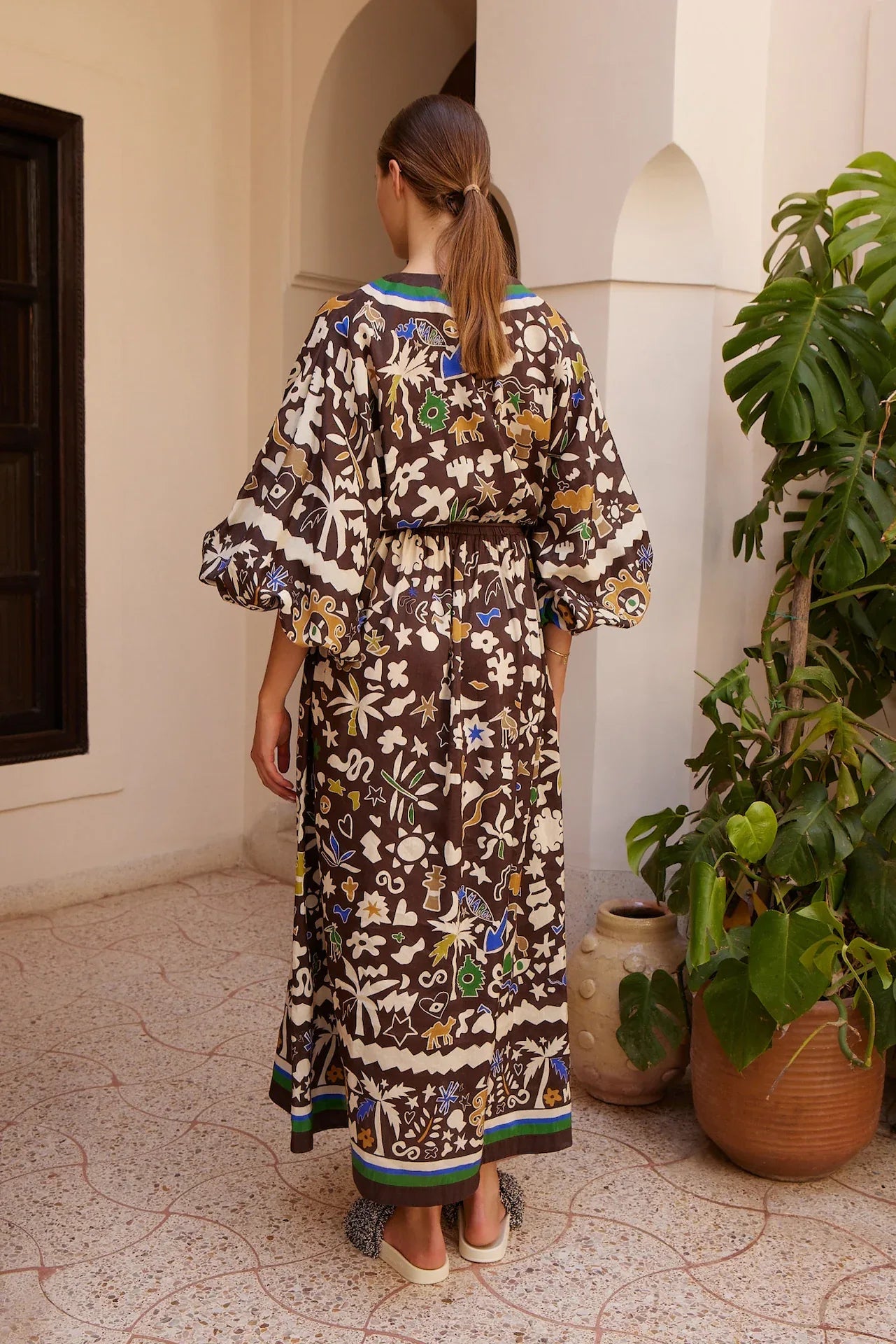 Alemais Maroc Midi Dress worn by model in natural setting LUXAMORE 