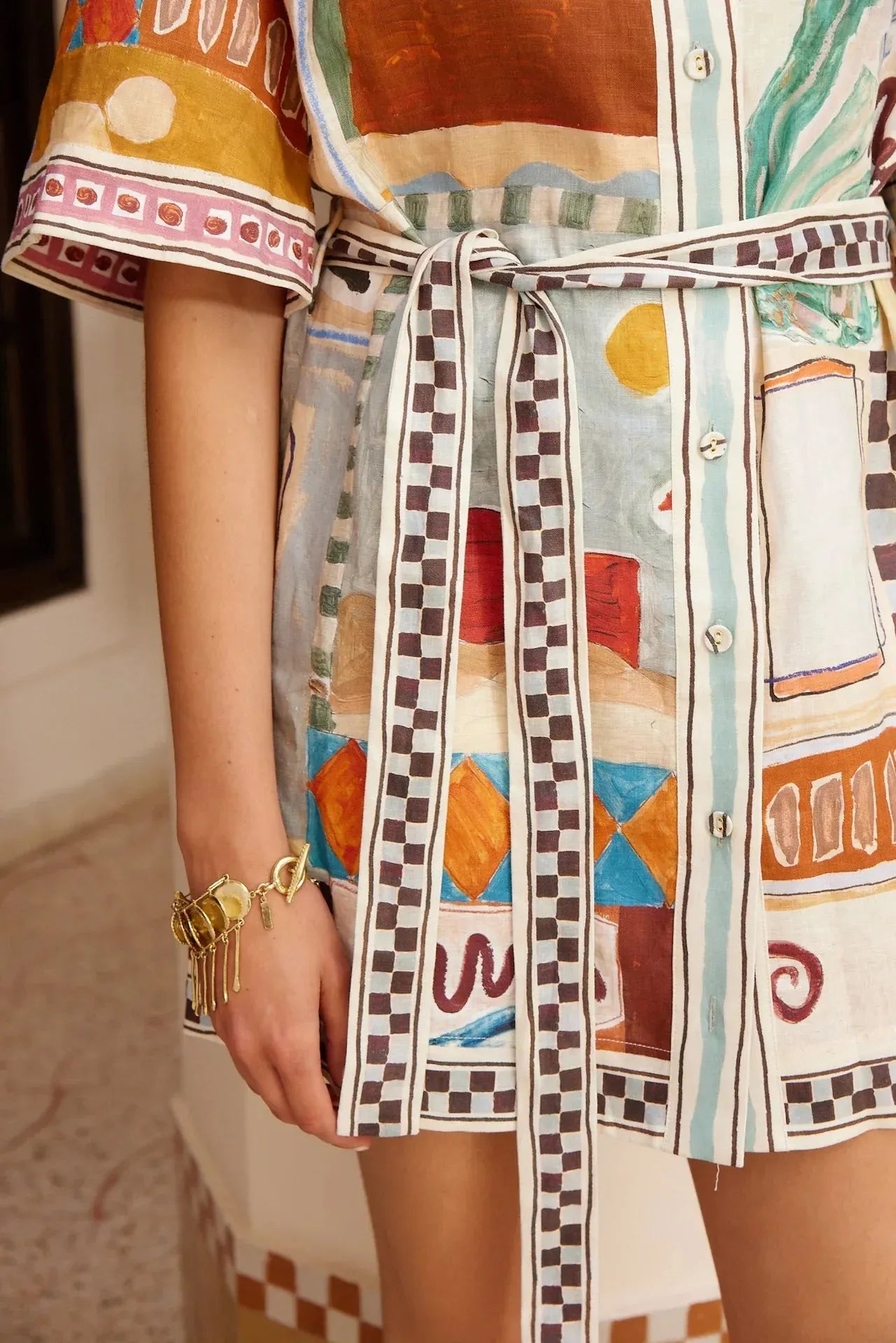 Alemais Michelle Mini Dress worn by model in natural setting LUXAMORE 