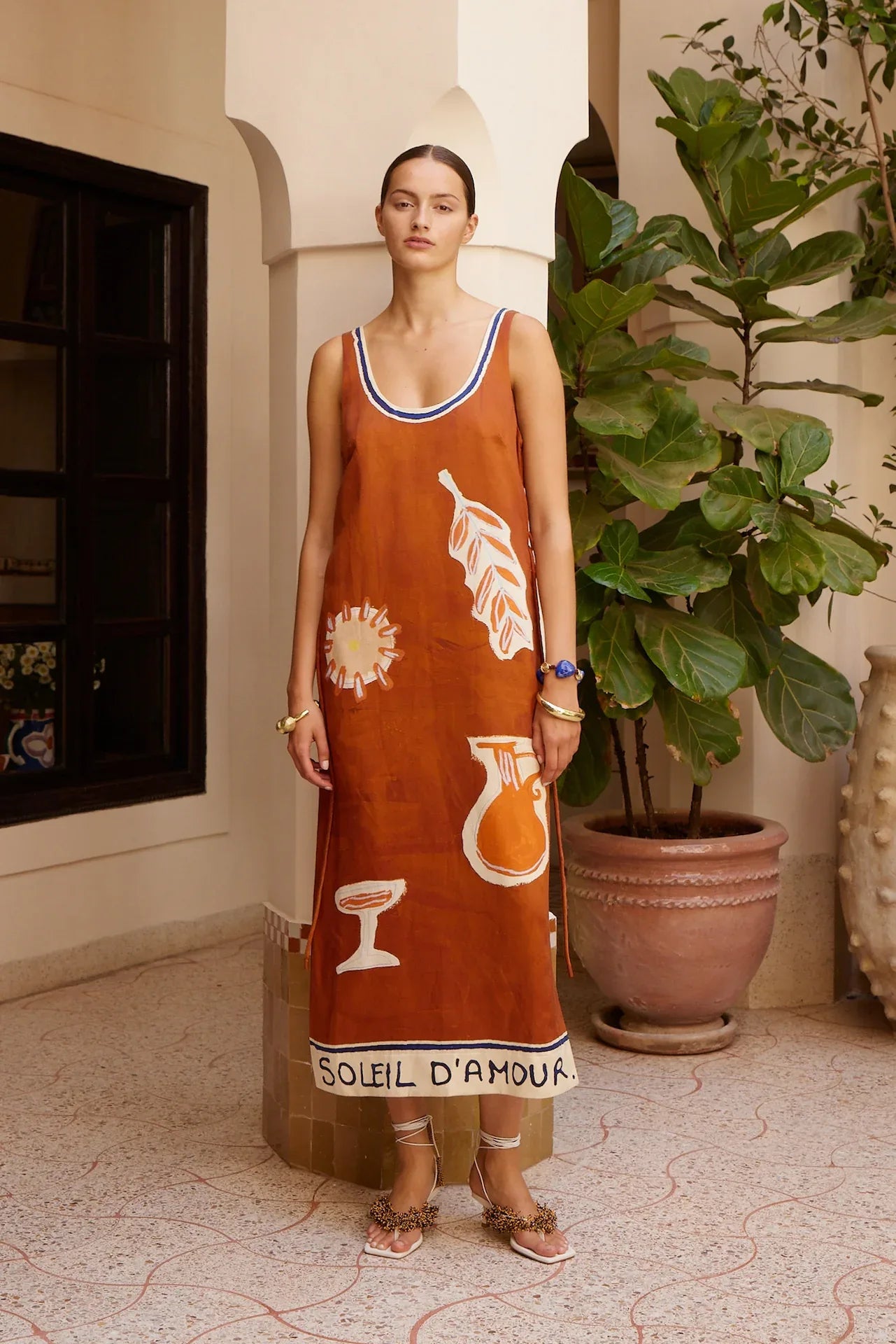 Alemais Soleil D'amour Silk Midi Dress worn by model in natural setting LUXAMORE 