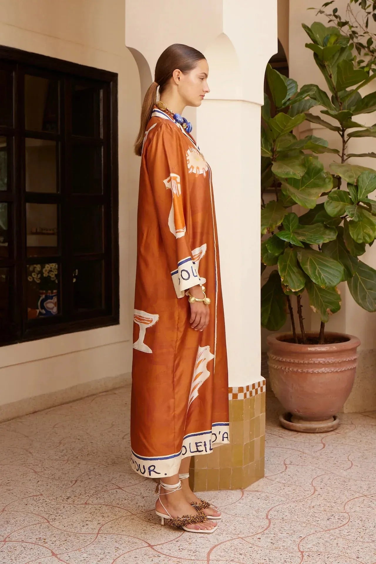 Alemais Soleil D'amour Silk Shirtdress worn by model in natural setting LUXAMORE 