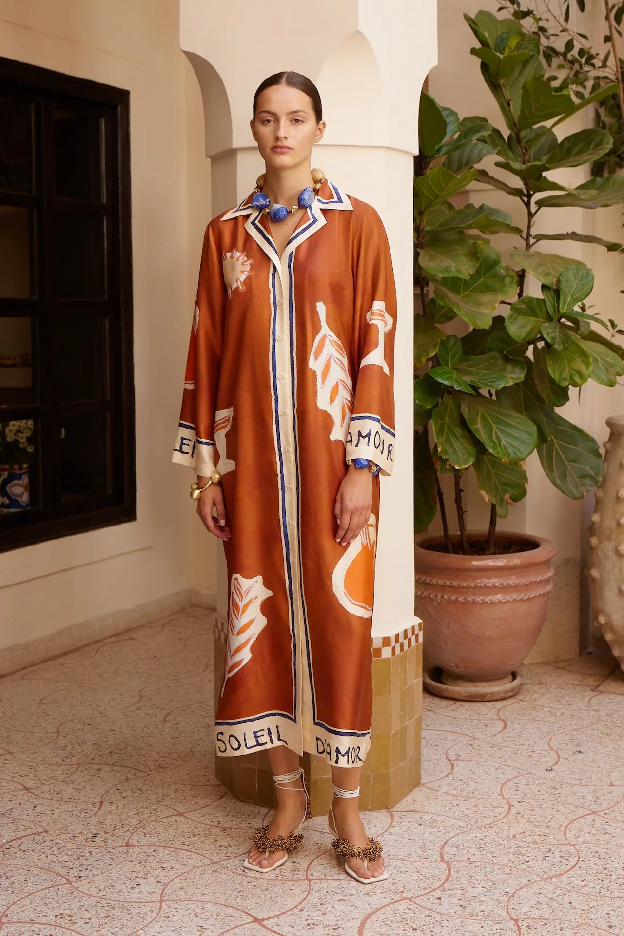 Alemais Soleil D'amour Silk Shirtdress worn by model in natural setting LUXAMORE 