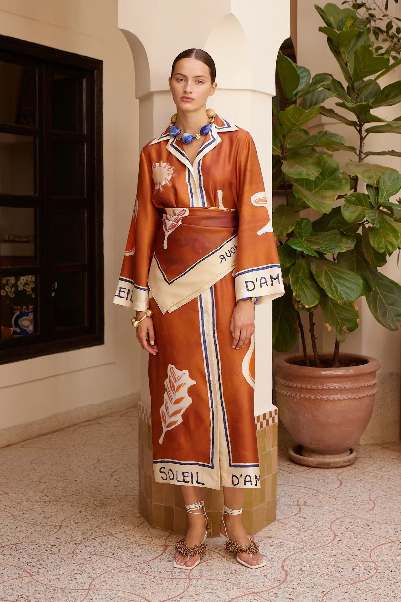 Alemais Soleil D'amour Silk Shirtdress worn by model in natural setting LUXAMORE 