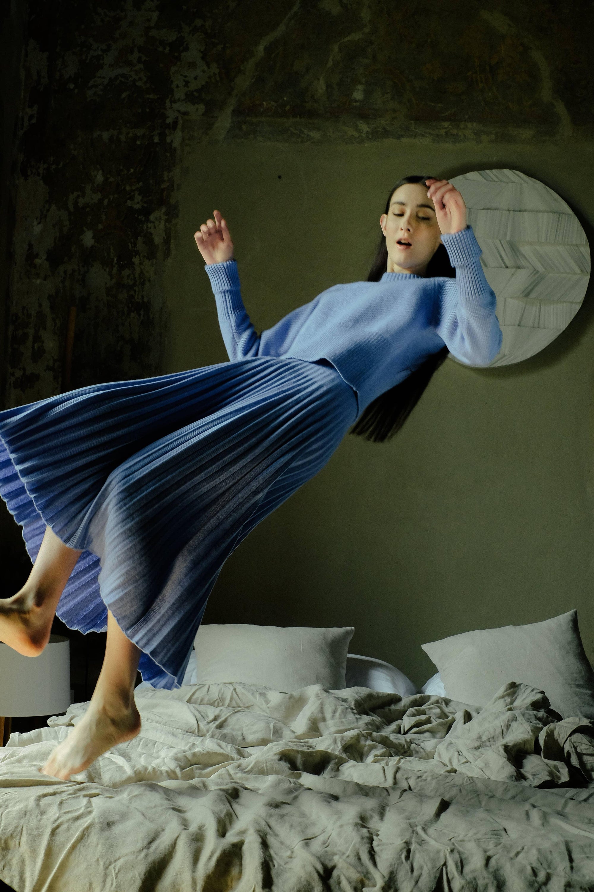 Cashmere pleated skirt Made in Italy by Lemme - Caramello worn by model in natural setting LUXAMORE 