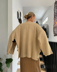 Lemme Cashmere Sweater Oversize Knit - Made In Italy: Beige worn by model in natural setting LUXAMORE 