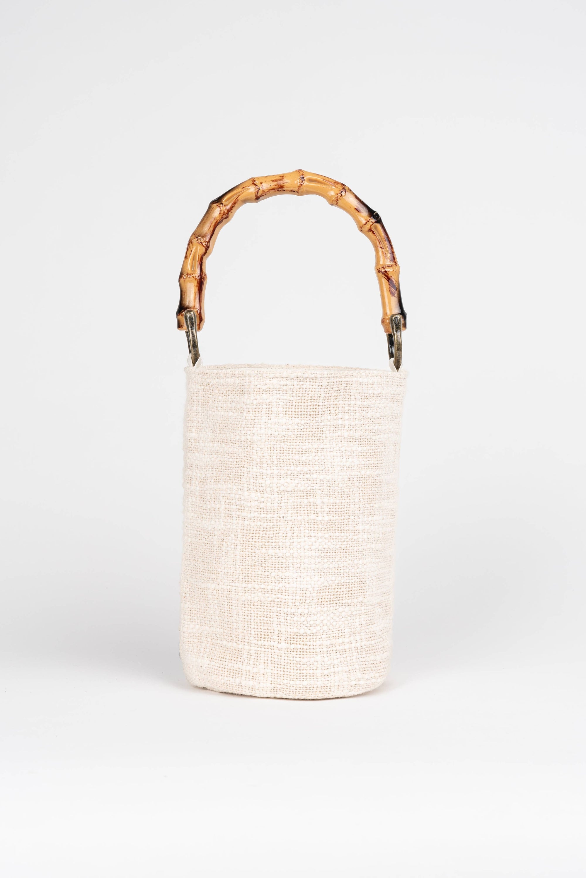 Curaco White Handbag Toucan worn by model in natural setting LUXAMORE 