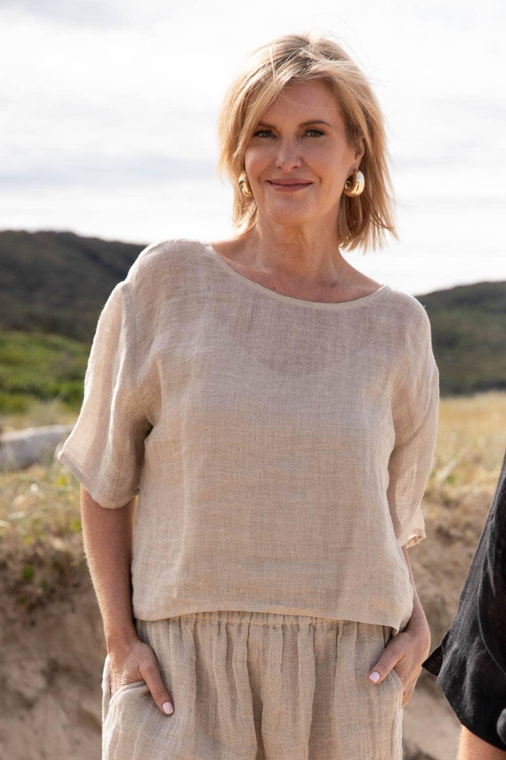 Eadie Lifestyle Olivia Linen Top worn by model in natural setting LUXAMORE 
