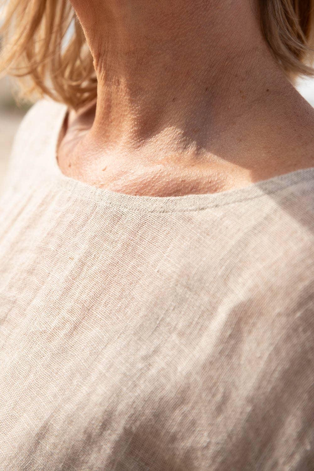 Eadie Lifestyle Olivia Linen Top worn by model in natural setting LUXAMORE 