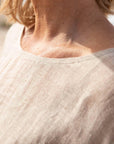 Eadie Lifestyle Olivia Linen Top worn by model in natural setting LUXAMORE 